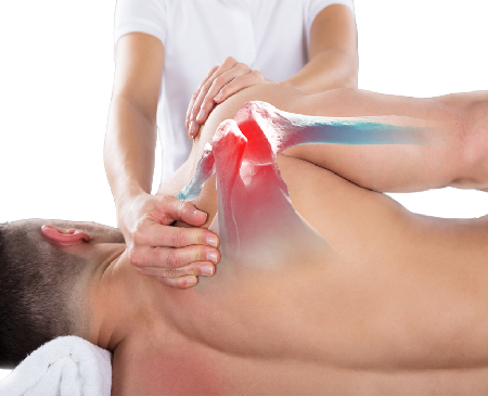 Physical therapist guiding a patient through rotator cuff strengthening exercises at Sumo Center Riyadh